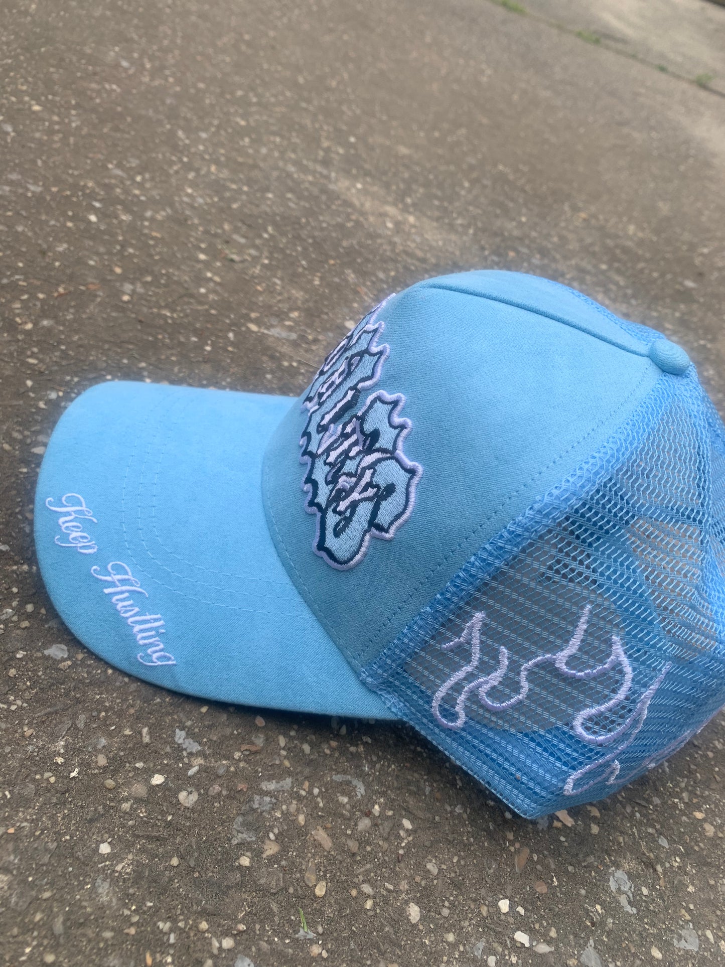 Blue “Keep Hustling” Hat